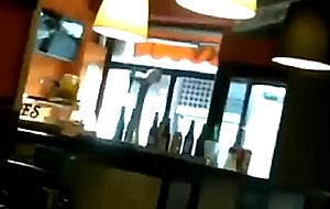 Teens toy in restaurant
