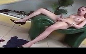 Tranny with big boobs jerking her cock