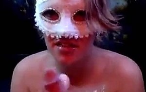 Busty masked housewife giving head