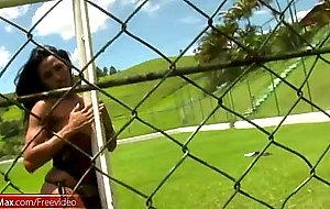 Busty latina ts exposes big breasts and butt on soccer field