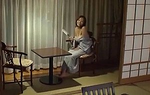 Busty japanese uses dildo