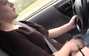 She fingers her pussy while driving 