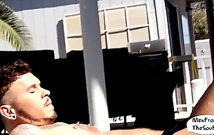 Tattooed muscular jock masturbates in the sun 