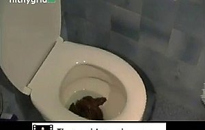 Girl pooping on the toilet 