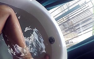 Beautiful model nude in the tub