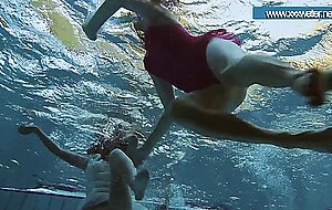 Hotly dressed teens in the pool