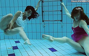 Hotly dressed teens in the pool