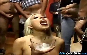 Jizz loving blonde masturbates with a dildo and gets facialized