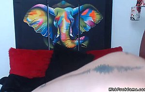Redhead camgirl in three bras stripping