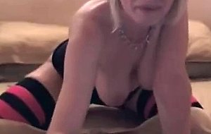 Milf plays with pink vibrator