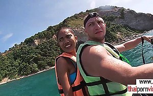 Thai teen girlfriend sucks boyfriends big cock outdoor