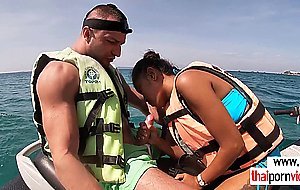 Thai teen girlfriend sucks boyfriends big cock outdoor