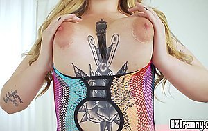 Chubby inked shemale Angelina riding on a big cock