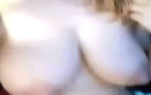 Sizzling busty babe squeezes her melons and rubs her pussy