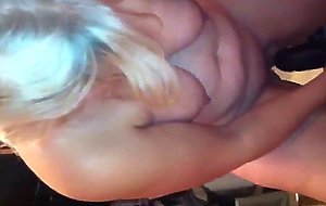 Girl playing with a huge black dildo