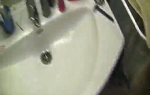 Blond beauty gets cum shot in bathroom