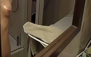 Blond beauty gets cum shot in bathroom