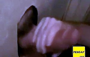 Hot sucking action at the homemade glory hole 6