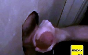 Hot sucking action at the homemade glory hole 6