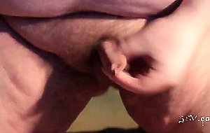 Fat boys tiny penis being pushed around while standing up.