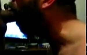 Hairy bear sucking cock