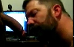 Hairy bear sucking cock