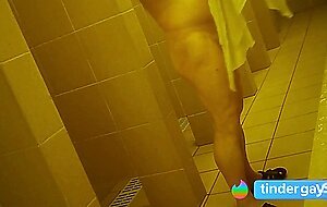 Naked men in public pool shower