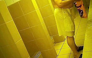 Naked men in public pool shower