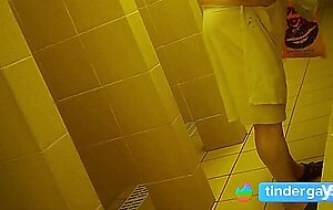 Naked men in public pool shower
