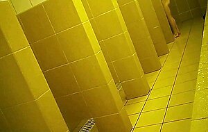 Naked men in public pool shower