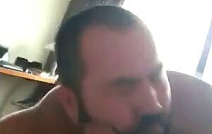 Bear sucking huge cock