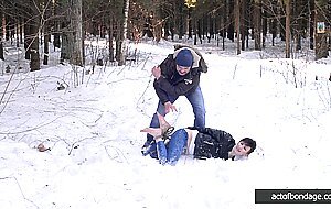 Barefoot Claudia is captured in the cold winter forest