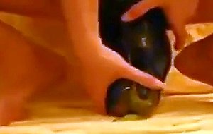 Amateur girl fucks eggplant
