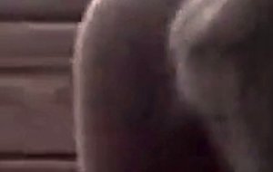 Blonde amateur with big fake tits giving head