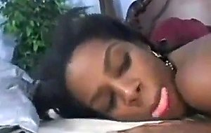 Thick ebony lesbian fucks tiny pussy with huge strapon