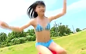 Cute japanese girl posing for...