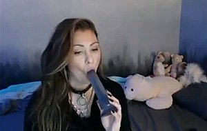 Emo girl puts vibrator in her mouth