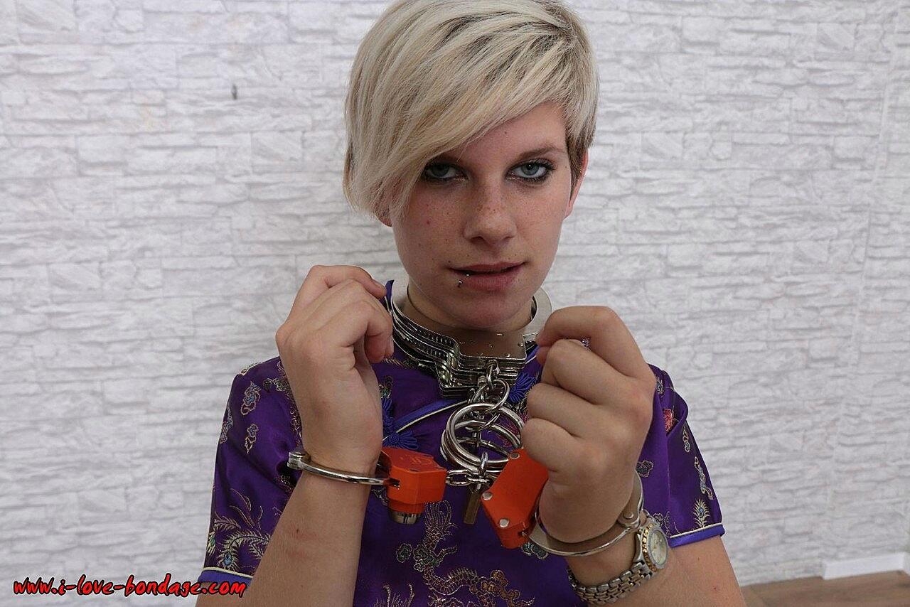 Short Haired Girl With Piercings Is Bdsm, Bondage, Close-Up, Clothed, Feet