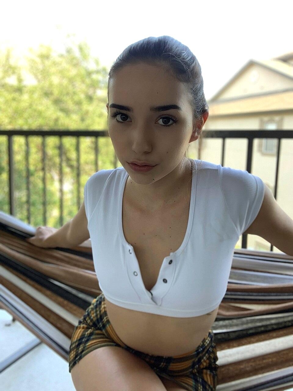 Pretty babe Samly Puff shows off her big ass wearing a sexy outfit