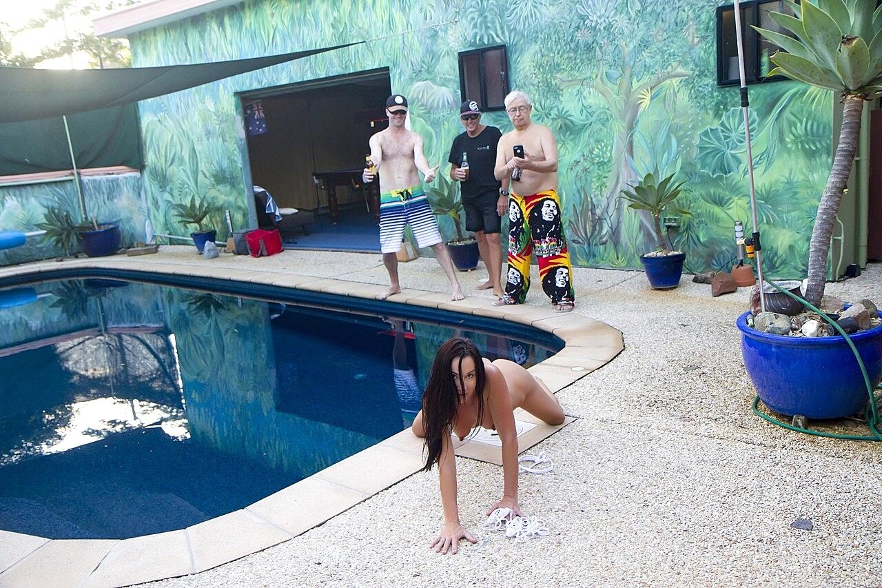 Amateur MILF Wild Thing gets stripped and groped by three men poolside