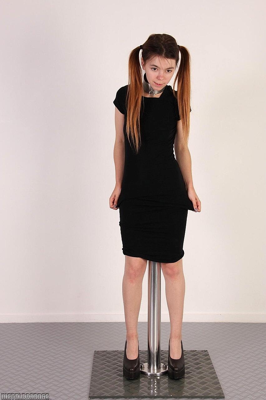 Collared teen Lina Roselina impales her pussy on an adjustable dildo stand