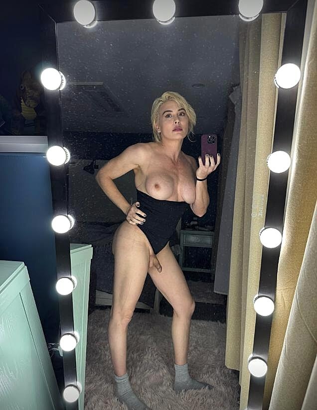Hot blonde shemale Mama HartX flaunts her curves & dick in a solo
